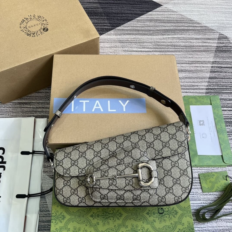 G*u*i top handle bags